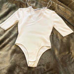 NWOT Vilanova Cream One Piece Bodysuit